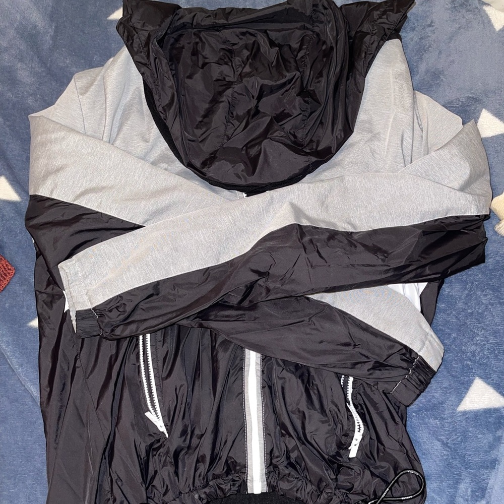 Black/white/gray zip up garage windbreaker